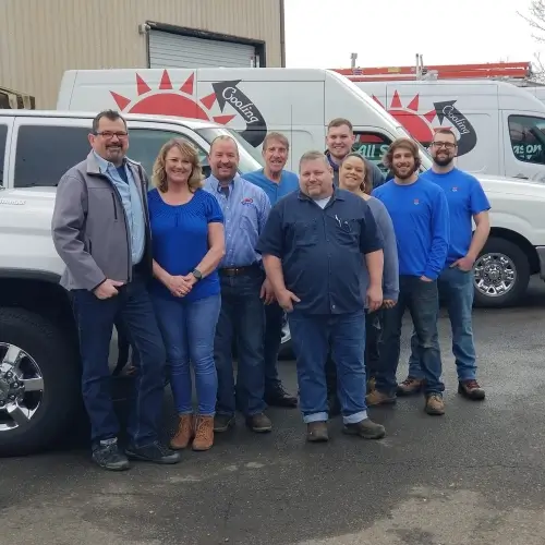 All Seasons Heating & Cooling staff in front of service vehicles | HVAC Contractor and HVAC Installation services in Vancouver WA and Portland OR